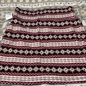 Set of four printed mini skirts